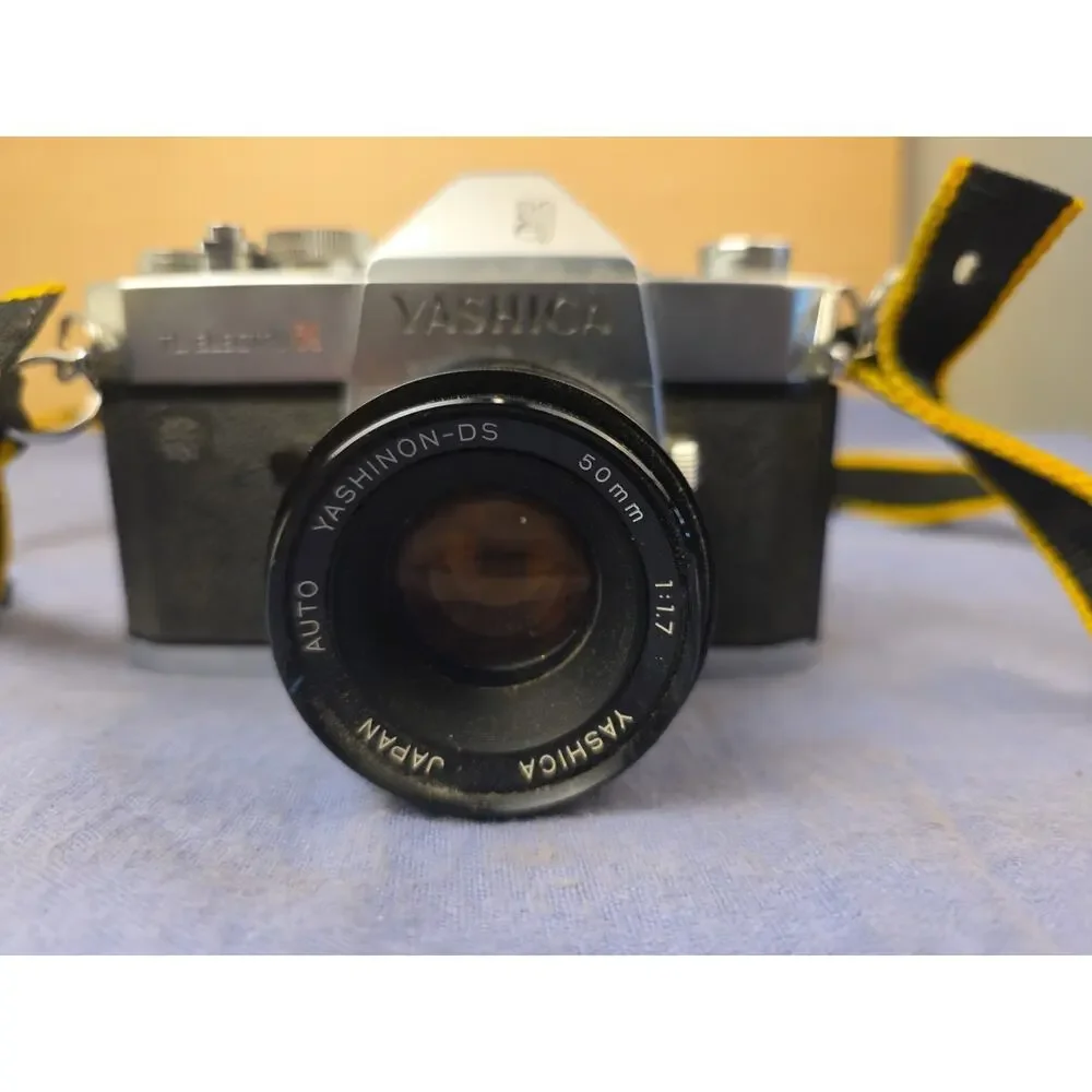 Yashica TL Electro-X 35mm SLR Film Camera with 50mm 1:1.7‎ Yashinon DS Lens.